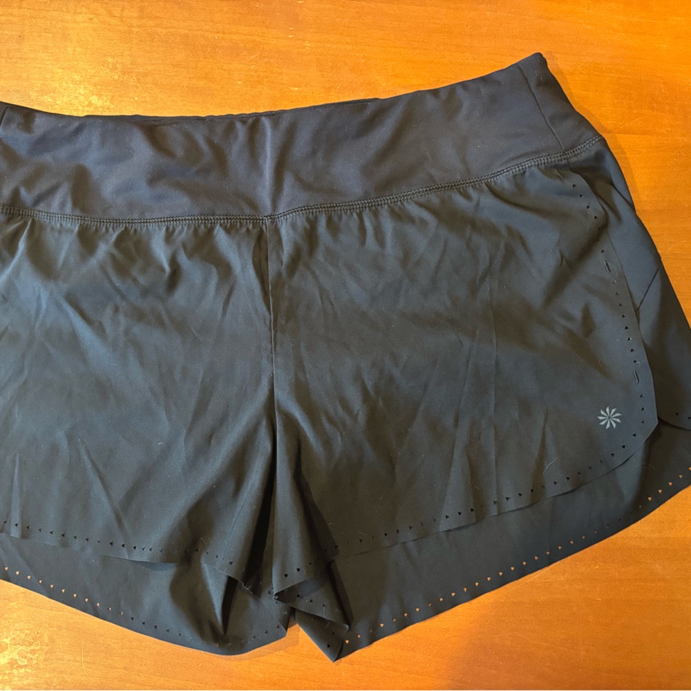 Athleta Black Performance Lazer Cut shorts with Logo